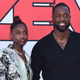 Dwayne Wade (R) and his daughter Zaya Wade arrive for the “Cheaper by the Dozen” Disney premiere at the El Capitan theatre in Hollywood, California, March 16, 2022. (Photo by Chris Delmas / AFP) (Photo by CHRIS DELMAS/AFP via Getty Images)